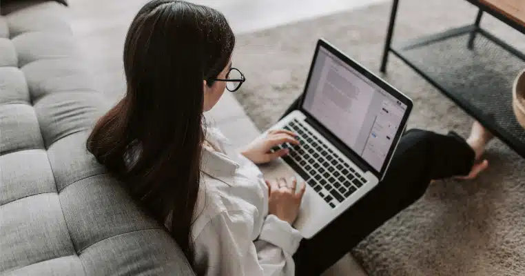 woman working at home using her laptop