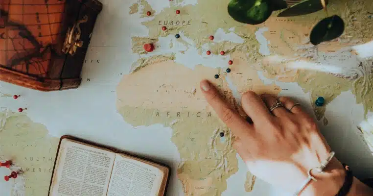 woman pointing at map