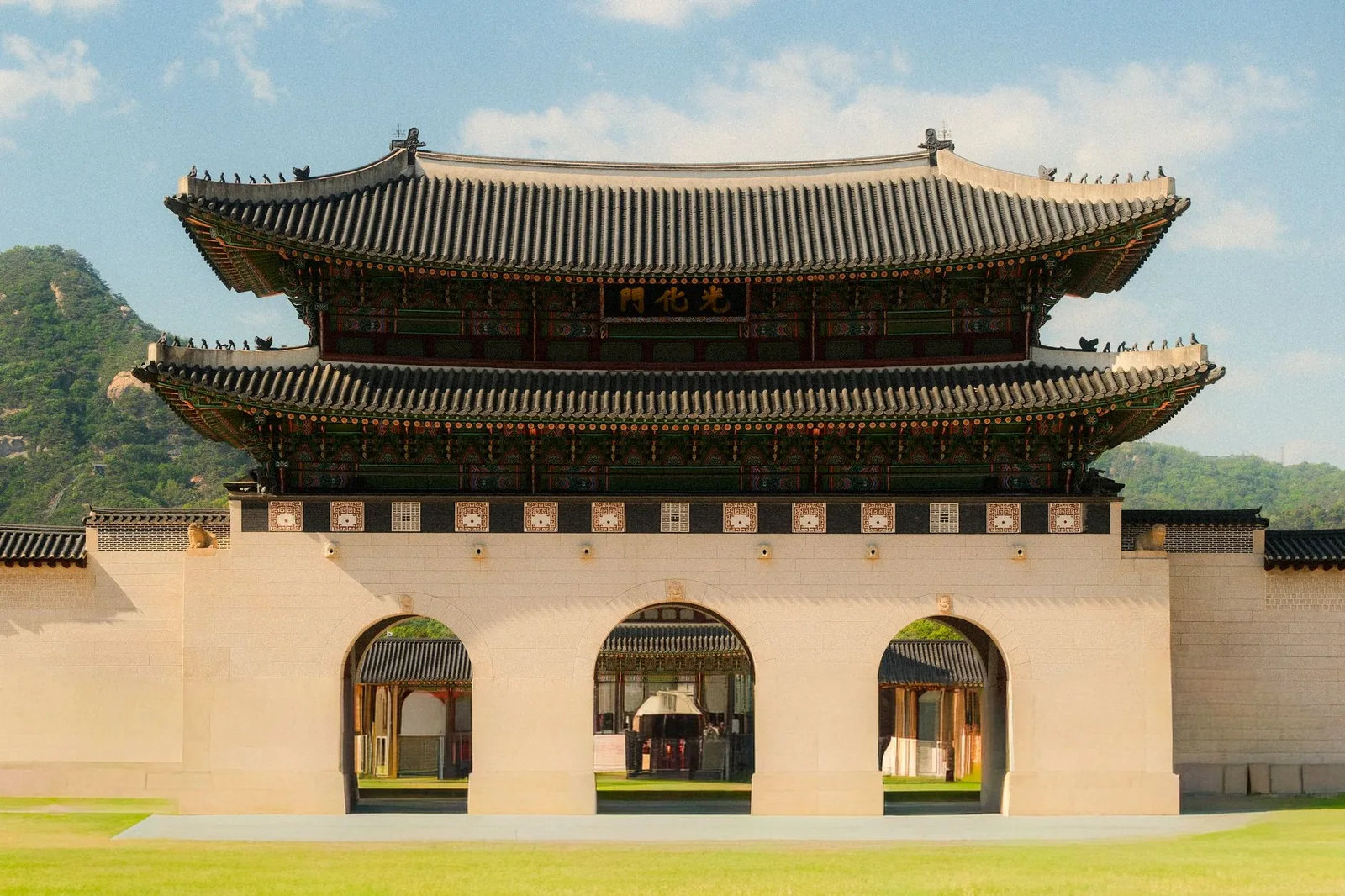Gwanghwamun Gate, the main entrance of Gyeongbokgung Palace in Seoul, under a clear blue sky